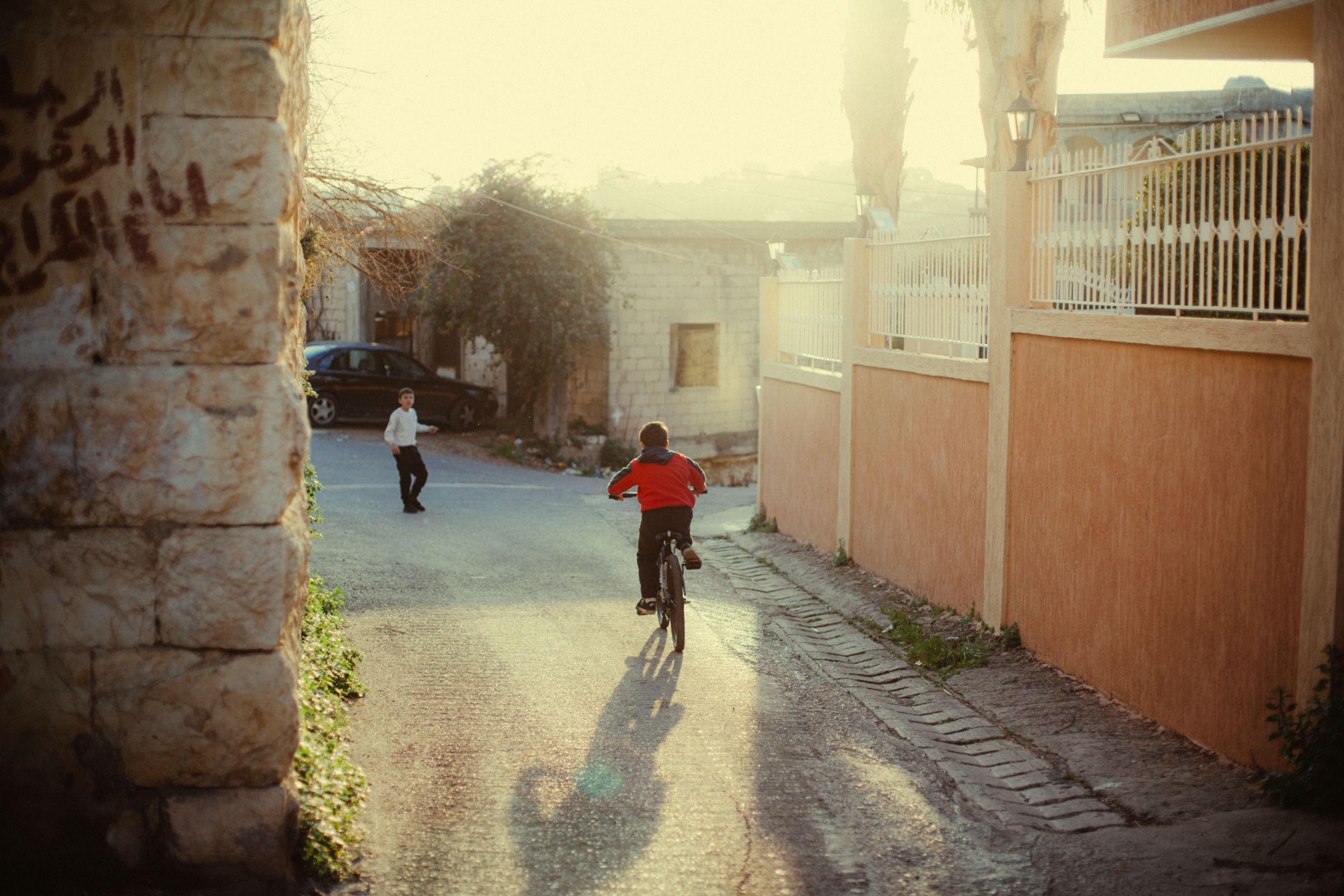 Kids playing in the street, Joun — Colored Air