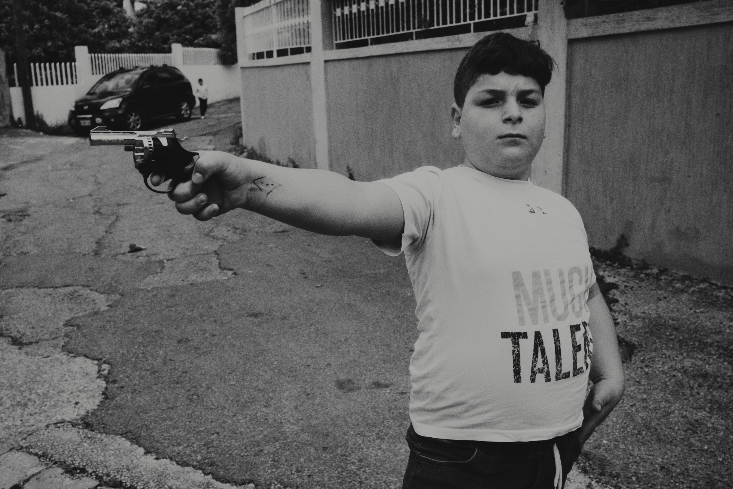 A boy with a toy gun, Joun — Before It Disappears