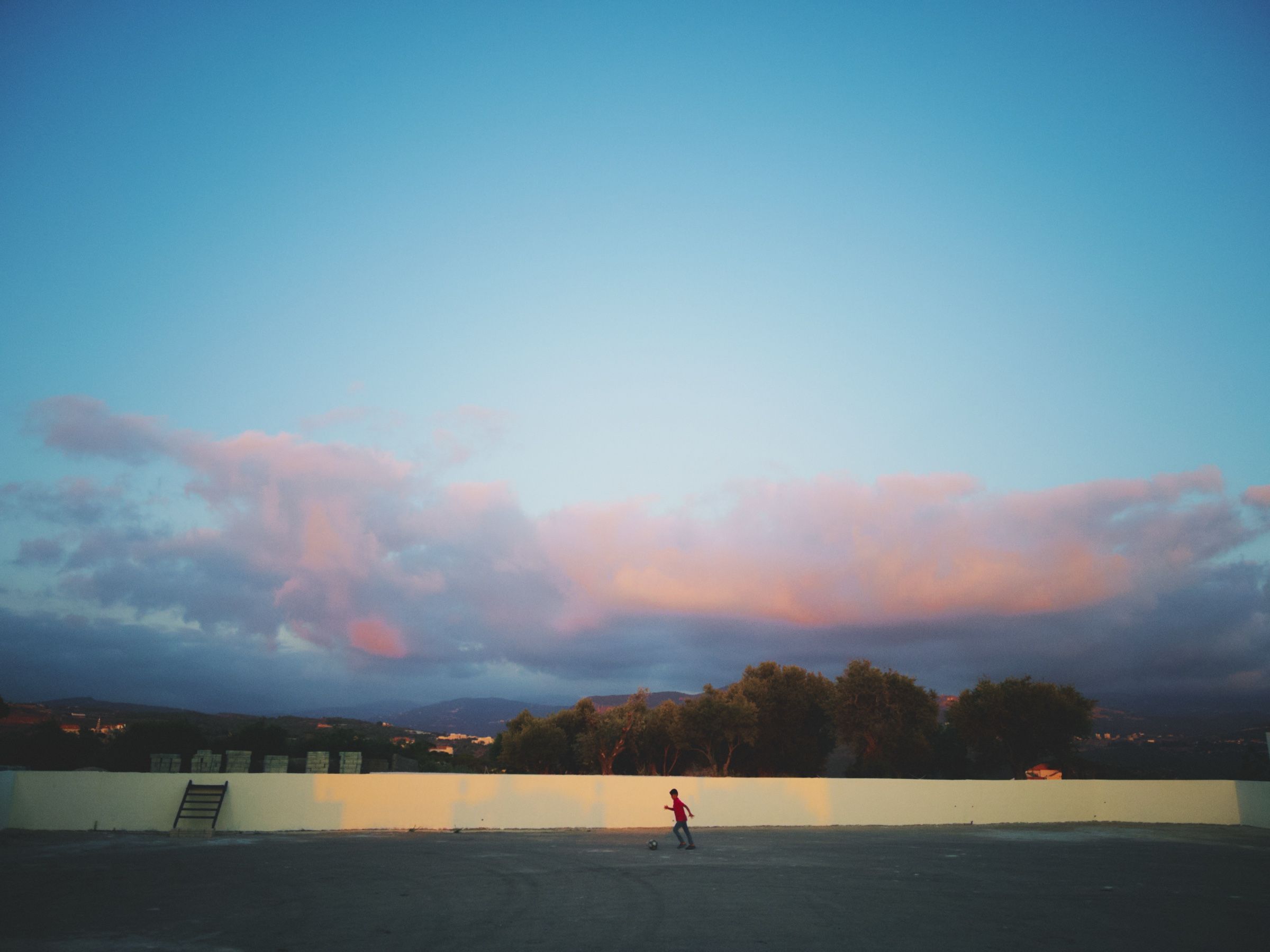 A boy with a soccer ball, Joun — Before It Disappears